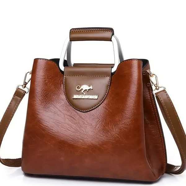 Elegant Brown Pebbled Leather Handbag with Gold-tone Horse Emblem, Structured Designer Purse with Detachable Shoulder Strap, Classic Women's