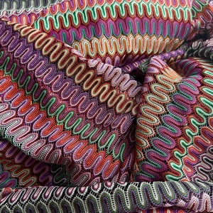 Multicoloured purple zig zag chevron knit fabric
