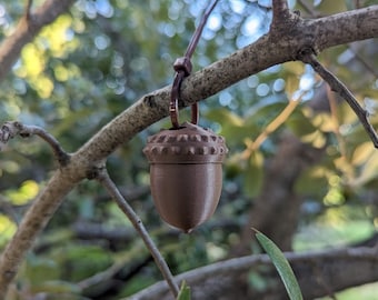 Acorn 3d printed geocache with a with log and zip-tie