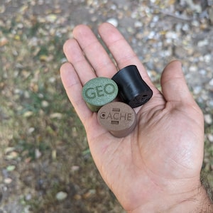 3d printed Geocaching Containers with logs and zip ties - ready to be hidden!