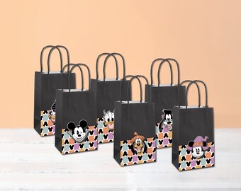 May include: Set of eight black paper gift bags with different Disney character designs. Each bag features a different character, including Mickey Mouse, Donald Duck, Goofy, and Pluto. The bags have a checkered pattern with pink, purple, and yellow accents.