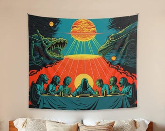 May include: A rectangular wall tapestry featuring a surreal illustration of a group of figures in teal robes seated at a long table. Above them, a large orange sun radiates light toward two large, toothy, dark-colored alien creatures.