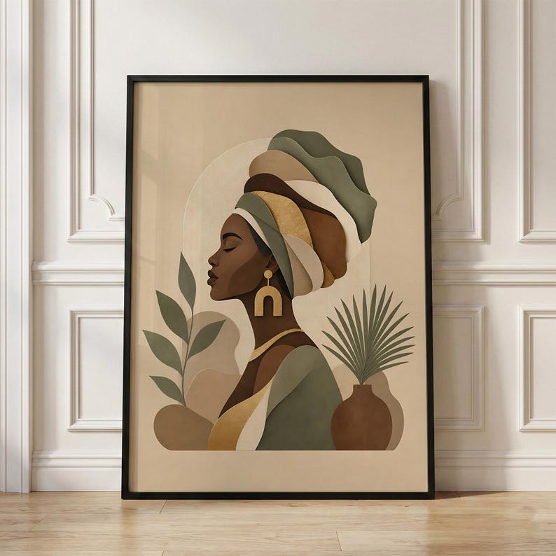 May include: A framed art print featuring a profile of a woman wearing a turban in shades of green, brown, and gold. The artwork includes a vase with a plant and other botanical elements, all in a neutral color palette. The print is in a black frame.