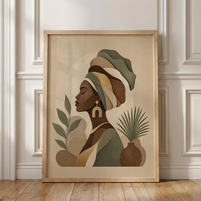 May include: A framed art print featuring a profile of a woman wearing a turban in shades of green, brown, and gold. The artwork includes botanical elements and a neutral background, creating a serene and elegant aesthetic.