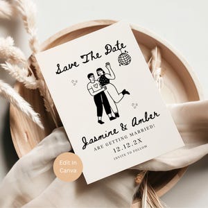 May include: A cream-coloured save-the-date card with black text and illustrations. The card features a couple dancing, a disco ball, and the names "Jasmine & Amber." The text reads "Save The Date" and "ARE GETTING MARRIED!" with a date and "INVITE TO FOLLOW."
