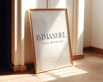 May include: A gold framed print with the word "Immanuel" and the phrase "God with us" in black text. The print also includes the reference "Matthew 1:23".
