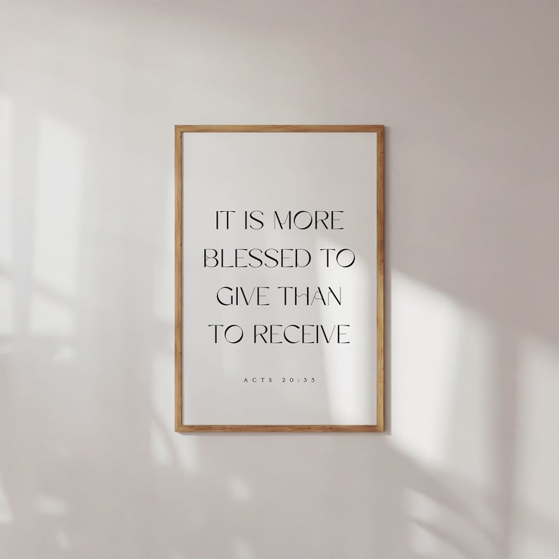 May include: A framed print with a white background and black text that reads "It is more blessed to give than to receive. Acts 20:35".