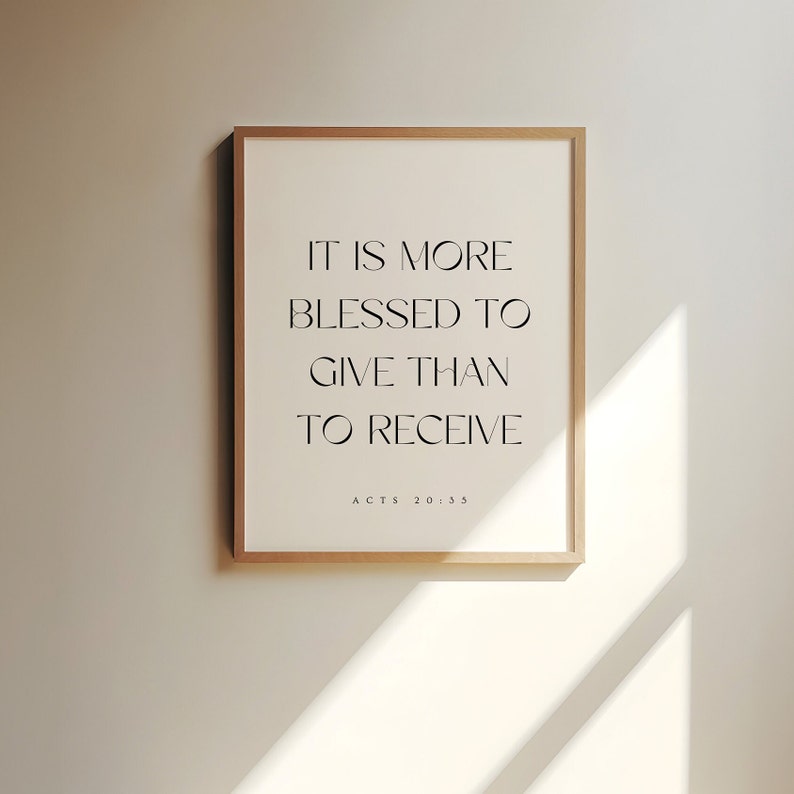 May include: A framed print with the text "It is more blessed to give than to receive" and the scripture reference "Acts 20:35".