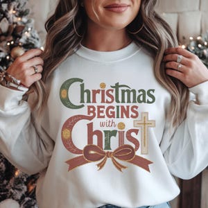 Christmas Begins with Christ Retro Coquette | Faith-Based Christmas Design| Christian Christmas Wall Art | Holiday T-Shirt Sweatshirt Gift
