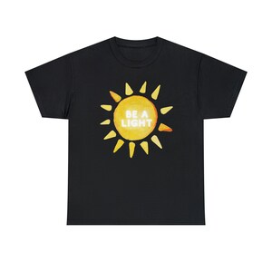 Be a Light Tee, Adult Sunshine Shirt, Womens Happy Sun T-Shirt, Cute Comfortable Tee, College Girls T-Shirt Gift, Meaningful Adult Clothes Black