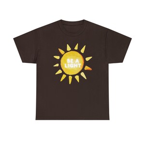 Be a Light Tee, Adult Sunshine Shirt, Womens Happy Sun T-Shirt, Cute Comfortable Tee, College Girls T-Shirt Gift, Meaningful Adult Clothes Dark Chocolate