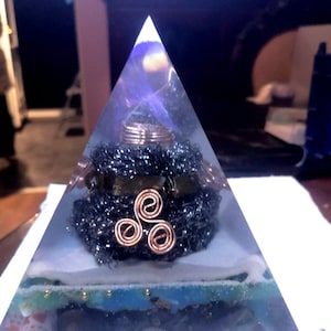 Orgonite pyramid with large real crystals!