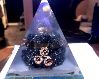 Orgonite pyramid with large real crystals!