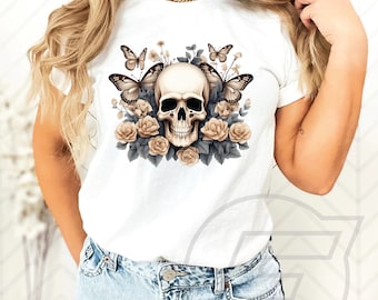 May include: White t-shirt with a graphic of a skull surrounded by roses and butterflies.