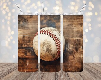 May include: Three stainless steel tumblers with a wood grain design and a baseball graphic. The baseball is white with red stitching and has a worn, vintage look.