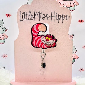 Cheshire Cat badge reel