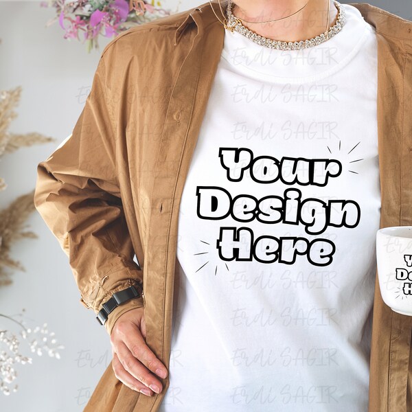 Stylish T-Shirt Mockup with Casual Trench Coat, Woman Holding a Ceramic Mug, Perfect for Fashion and Lifestyle Brands