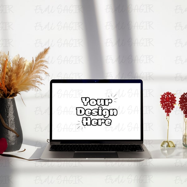 Stylish Laptop Mockup on White Desk with Artistic Floral Accents, Perfect for Digital Product Displays & Remote Work Promotion