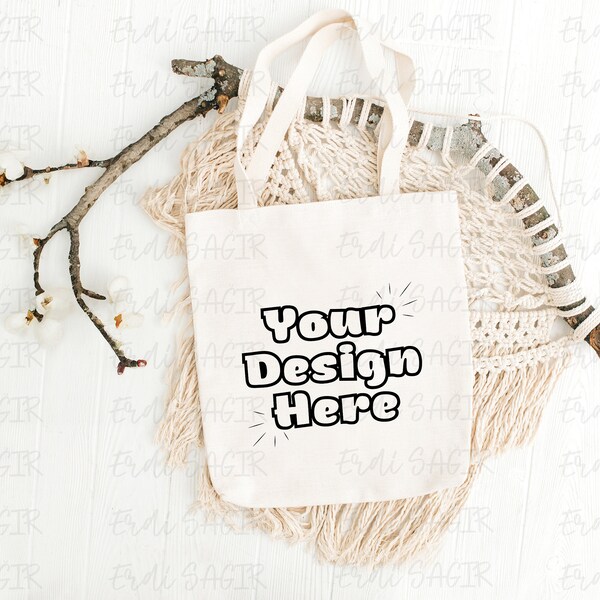 Bohemian Canvas Tote Bag Mockup on White Wooden Background, Accented with Cotton Branches and Macrame, Ideal for Eco-Friendly Products