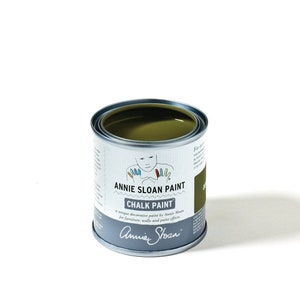 May include: A green Annie Sloan Chalk Paint tin with the brand name and product description on the label.