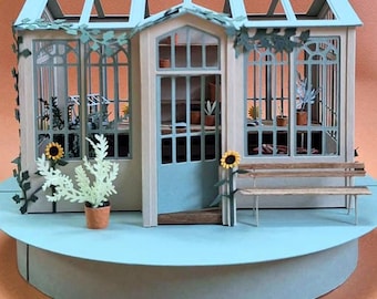 Invernadero de papel en miniatura