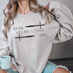 Custom In My Villain Lover Era Sweatshirt, Romance Reader Bookish Merch, Romantasy Morally Grey Gray, Personalize Name on Sleeve