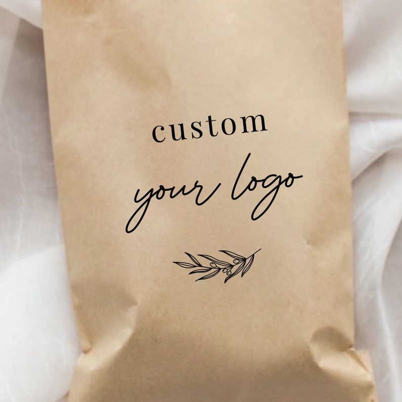 May include: A brown paper bag with the text "custom your logo" and a small black and white illustration of a branch with leaves.