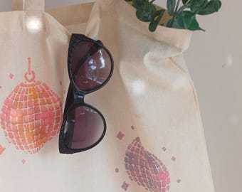 Bolso tote con bola de discoteca: acabado metálico brillante