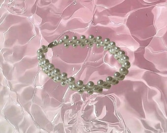 Elegante pulsera hecha a mano con cuentas de perlas
