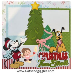 May include: A Christmas-themed scrapbook layout featuring Mickey Mouse, Pluto, and a young girl. The layout includes a green Christmas tree, a pink ribbon, and the text "Christmas Tree Stroll". The background has a patterned design.
