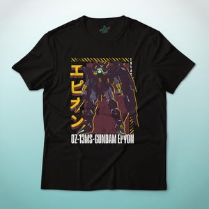 May include: Black t-shirt featuring a stylized illustration of a Gundam Epyon robot. The design includes Japanese text and the text "OZ-13MS-GUNDAM EPYON" in white. The robot is depicted in shades of purple, yellow, and green.