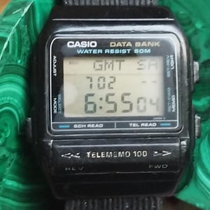 Vintage Casio DBX-101W Data Bank Telememo 100 digital watch. Module 696 Work with Issues