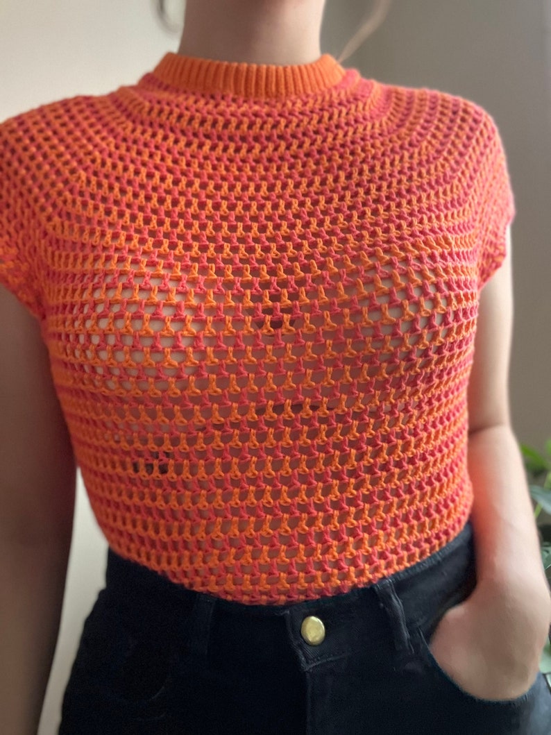 Trendy made to measure summer crochet mesh top. Made with a double folded collar and a raglan sleeve, this chic, sexy crochet top will be your summer staple.