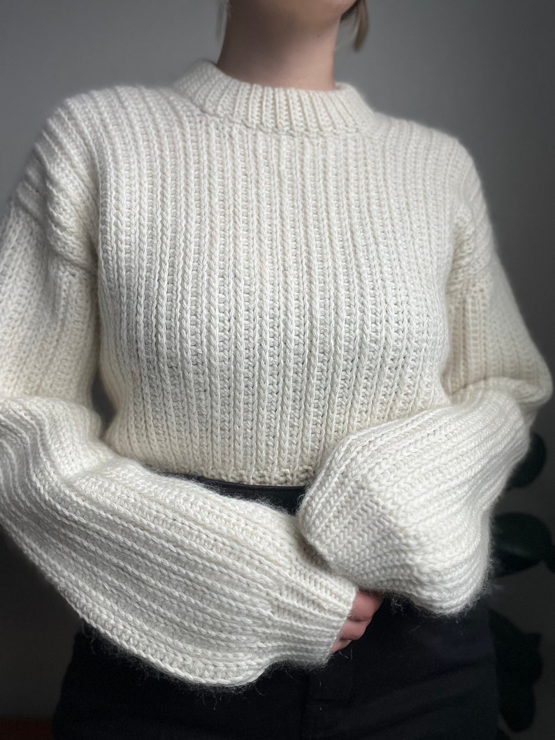 Vintage-inspired beginner-friendly crochet sweater pattern PDF. Uses mock-knit stitches to give a timeless chic look.