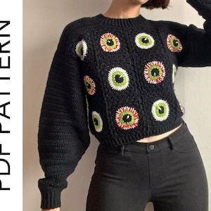 Size inclusive spooky Halloween crochet granny square eyeball sweater. Comes cropped with a relaxed fit and cozy bishop sleeves. Video tutorials for granny square eyeballs.