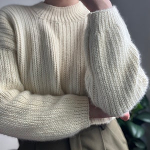 Beginner-friendly mock knit crochet sweater pattern. Chic, modern crochet sweater with knit-like stitches and mock turtleneck. Size inclusive, cropped crochet pattern ranging in sizes XS-5X