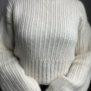 Vintage-inspired beginner-friendly crochet sweater pattern PDF. Uses mock-knit stitches to give a timeless chic look.
