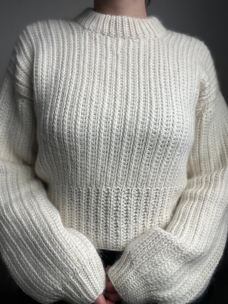 Vintage-inspired beginner-friendly crochet sweater pattern PDF. Uses mock-knit stitches to give a timeless chic look.