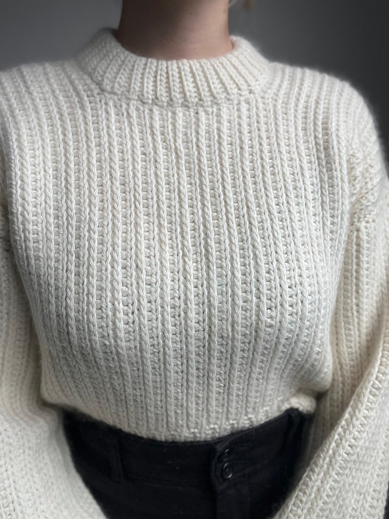 Vintage-inspired beginner-friendly crochet sweater pattern PDF. Uses mock-knit stitches to give a timeless chic look.