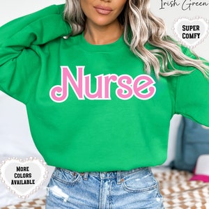 Pink and Green Nurse Sweatshirt Nursing Graduate Christmas Gift Custom RN Sweater Medical Professional Gift Coworker Appreciation Nurse Week