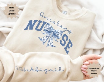 Sudadera de enfermera oncológica con lazo floral, camisa a juego de la unidad oncológica, regalos de cumpleaños para futuras enfermeras, agradecimiento a compañeras de trabajo y graduadas de la escuela de enfermería.