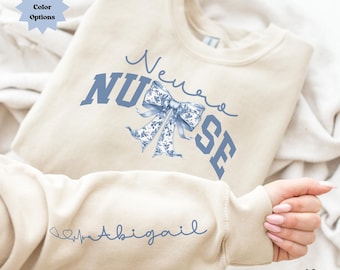 Sudadera con lazo personalizada para enfermera neurológica, cuello redondo floral para neurología, camisa personalizada para enfermera de trauma, regalo de graduación para enfermera, regalo para futura enfermera y compañero de trabajo.