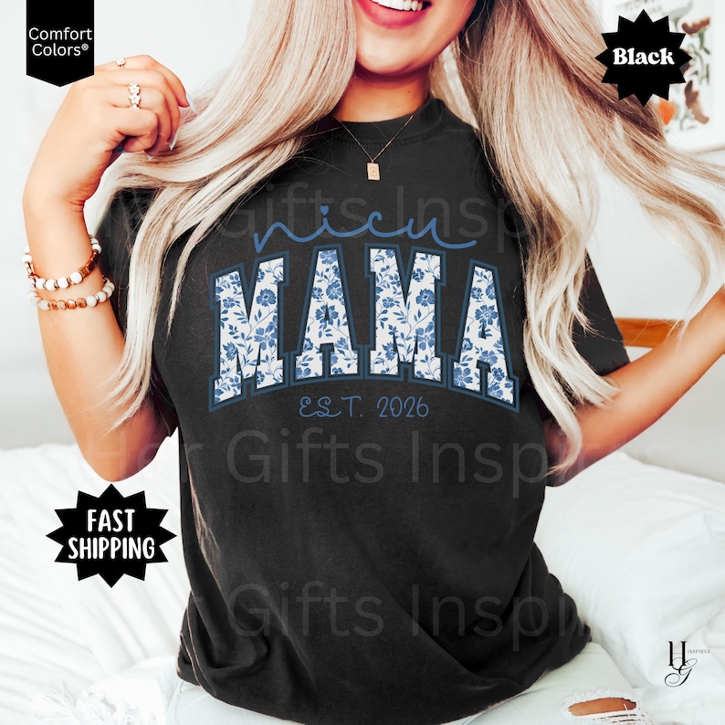 May include: Black t-shirt with the word "Mama" in a floral design, with "Est. 2026" below. The word "nicest" is above "Mama". The shirt is a Comfort Colors brand.