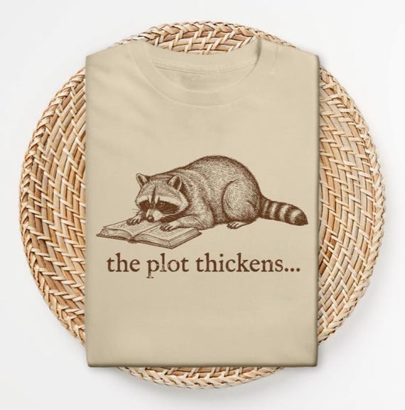 Funny Raccoon Shirt “The Plot Thickens” | Book Lover Tee | Cottagecore Shirt | Reader Gift