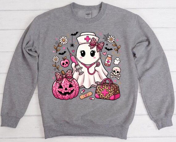 Cute Halloween Nurse Sweatshirt, Pink Ghost Nurse Shirt, Spooky Nursing Crewneck, Healthcare Worker Gift for Women