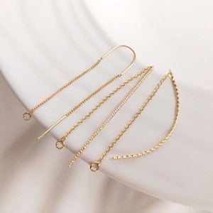 Op de afbeelding: Een set van zes gouden ketting oorbel verlengstukken. De verlengstukken zijn gemaakt van verschillende ketting stijlen en lengtes.
