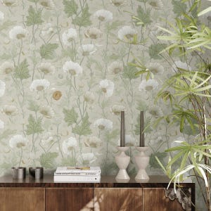 May include: A floral wallpaper design featuring white and tan poppy flowers with green leaves and stems on a light green background. The image also shows a wooden cabinet with decorative items, including candles and books.