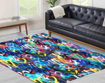 Pode incluir: Um tapete colorido com um design de estilo graffiti que apresenta um padrão repetitivo de corações e formas abstratas em tons de azul, vermelho, amarelo, rosa, branco e preto.