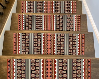 May include: Stair treads with a geometric pattern in shades of brown, red, and cream. The treads are rectangular and feature a repeating design of stylized shapes and lines. The stairs are made of wood.