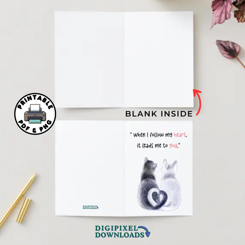 May include: Printable card with a watercolor illustration of two cats with a heart shape formed by their tails. The text on the card reads "when I follow my heart, it leads me to you."